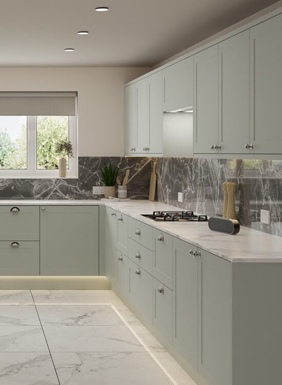 a muted pistachio green kitchen featuring modern matt finish Richmond cabinet doors