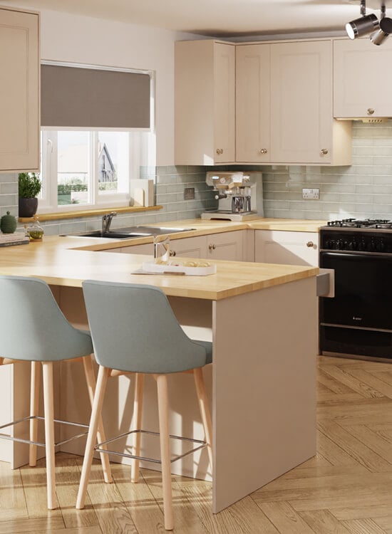 a muted reed green kitchen featuring traditional matt finish Juliette cabinet doors