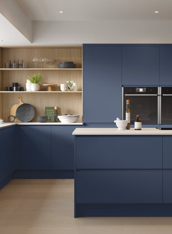 a contemporary indigo-coloured kitchen featuring the Jayline style cabinet doors